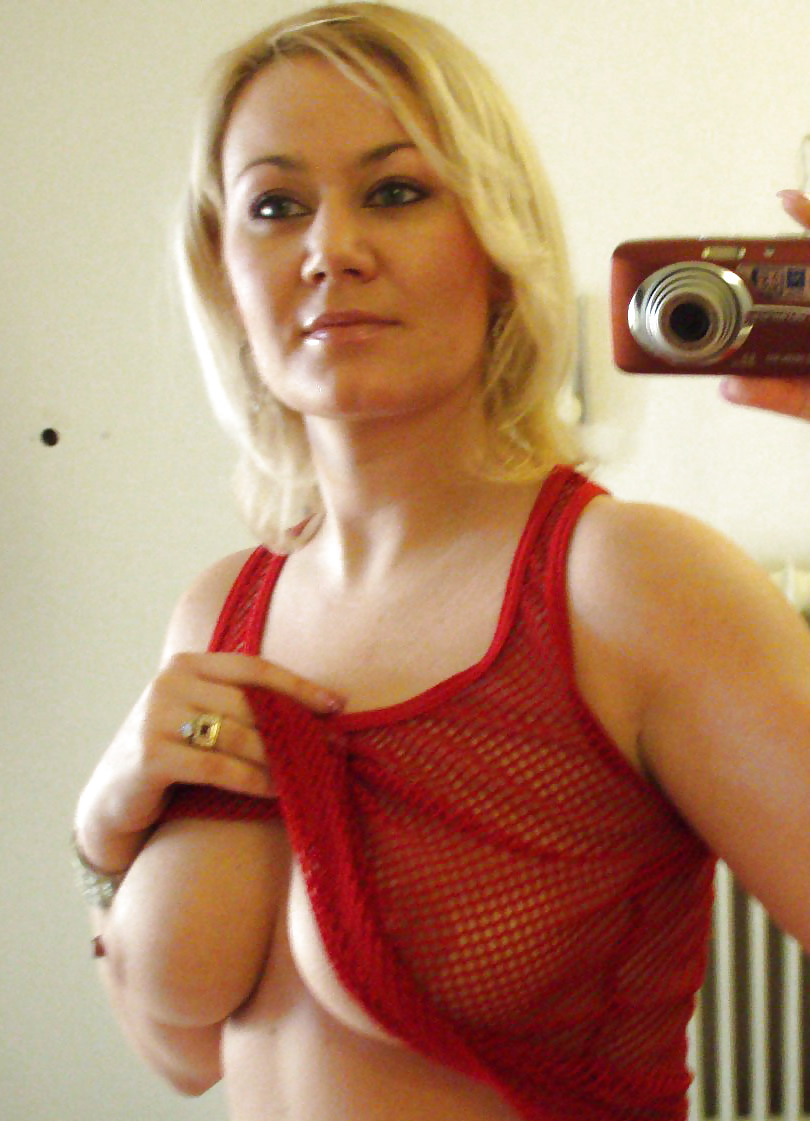 blonde amateur milf taking a pic of her tits